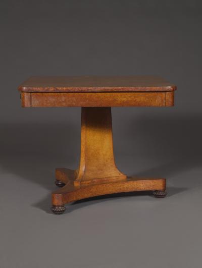 A Finely Figured Amboyna Late Regency Library Table