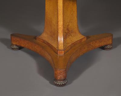 A Finely Figured Amboyna Late Regency Library Table