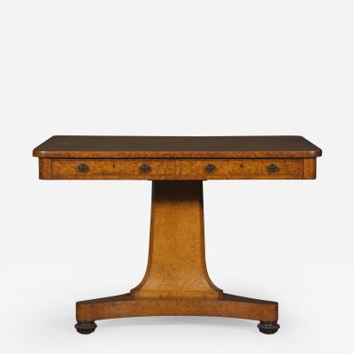 A Finely Figured Amboyna Late Regency Library Table