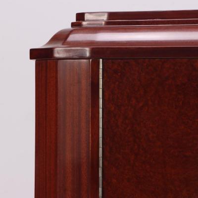 A French Art Deco amboyna wood and mahogany cabinet wardrobe C 1930 