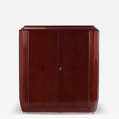 A French Art Deco amboyna wood and mahogany cabinet wardrobe C 1930 