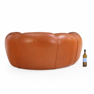 A French Bulbous Croissant shaped Leather Chair C 1985 