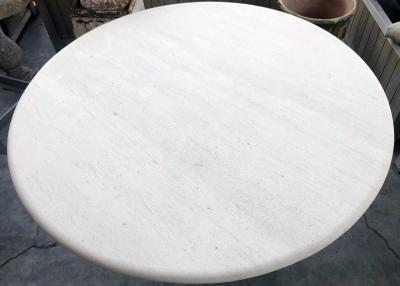 A French Carved Limestone Circular Table on a Baluster form Base