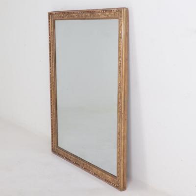 A French Empire gold mirror 19th C