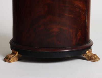A French Empire style cylinder shaped somno mahogany pedestal bedside cabinet