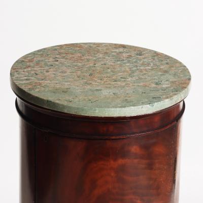 A French Empire style cylinder shaped somno mahogany pedestal bedside cabinet