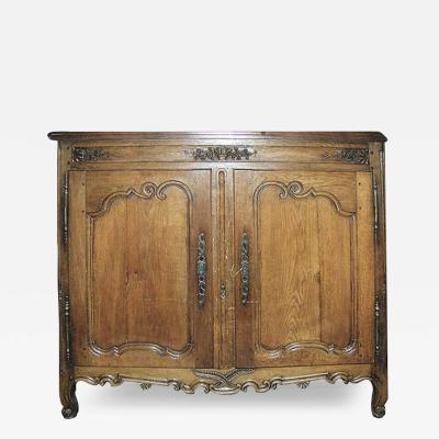 A French Louis XV Carved Provincial Ashwood Buffet