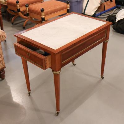 A French Louis XV I Style Mahogany Table with inset Carrara Marble circa 1840