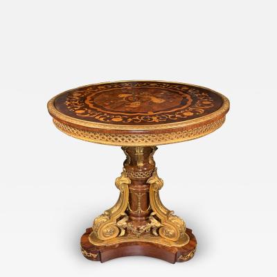 A French Louis XV Style Ormolu Mounted Marquetry Circular Center Table