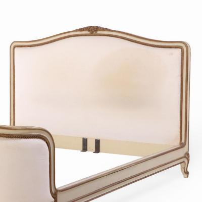 A French Louis XV style Queen size painted and carved bed circa 1940 