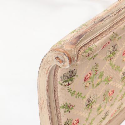 A French Louis XV style Queen size painted and carved bed circa 1950 