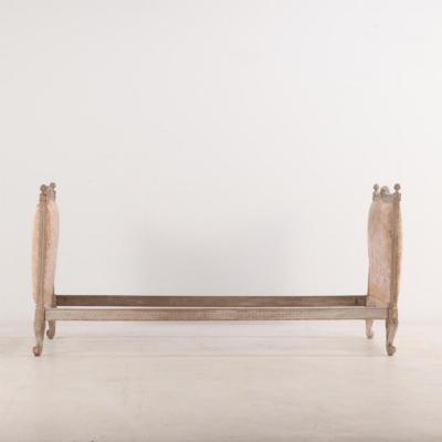 A French Louis XV style carved and painted daybed C 1900 