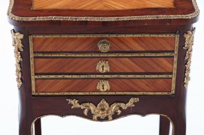 A French Louis XV style kingwood and rosewood cabinet C 1900