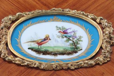 A French Louis XV style kingwood and rosewood cabinet C 1900