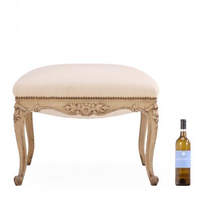 A French Louis XV style painted and carved wood upholstered stool C 1900 