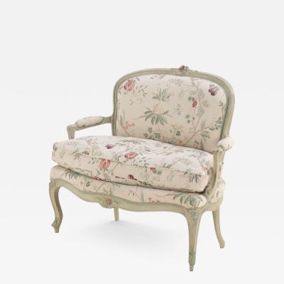 A French Louis XV style painted and upholstered settee C 1900 