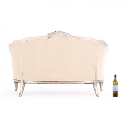 A French Louis XV style silver leaf carved settee C 1930 