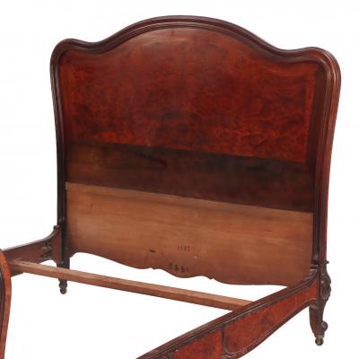 A French Louis XV style walnut and burl walnut full size bed C 1900 