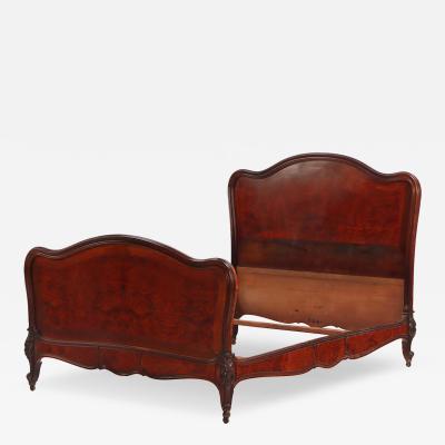 A French Louis XV style walnut and burl walnut full size bed C 1900 