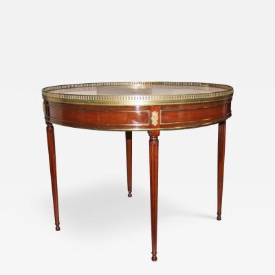 A French Louis XVI Mahogany Bouillotte Table