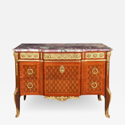 A French Louis XVI Style Ormolu Mounted Marquetry and Parquetry Commode