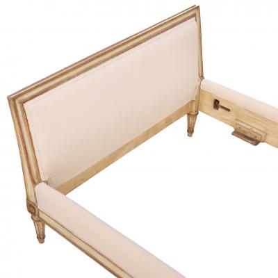A French Louis XVI style Painted and Gilt Twin Bed C 1940 