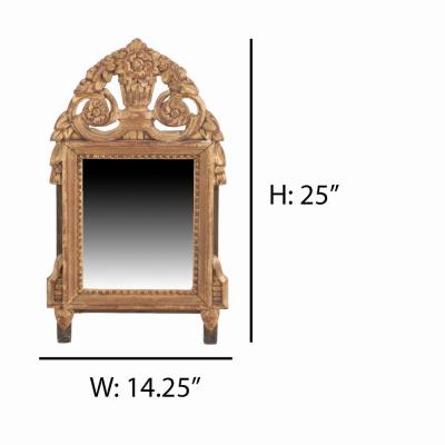 A French Louis XVI style carved and giltwood mirror C 1810 