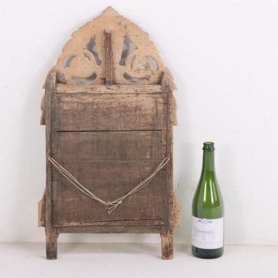 A French Louis XVI style carved and giltwood mirror C 1810 