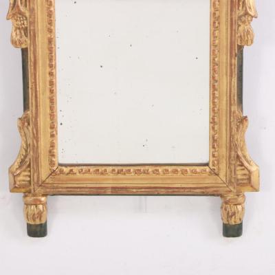 A French Louis XVI style carved and giltwood mirror C 1810 