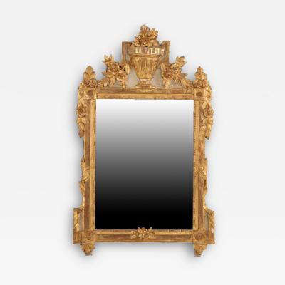 A French Louis XVI style carved and giltwood mirror early to mid 19th C 