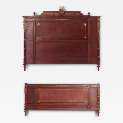 A French Louis XVI style king size headboard and footboard C 1900 