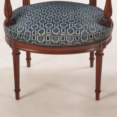 A French Louis XVI style open armchair C 1940 