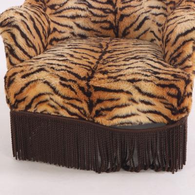 A French Lounge Chair covered in faux tiger fabric 19th C 