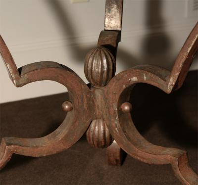 A French Wrought Iron and Marble Top Round Bistro Table