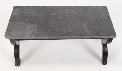 A French ebonized Empire style marble top coffee table with bronze mounts 