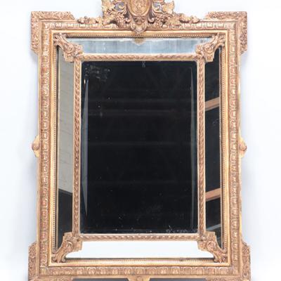 A French gilt wood and gesso mirror with mirrored border Circa 1900 