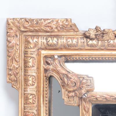 A French gilt wood and gesso mirror with mirrored border Circa 1900 