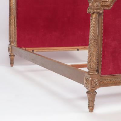 A French giltwood Louis XVI style full size bed C 1900 
