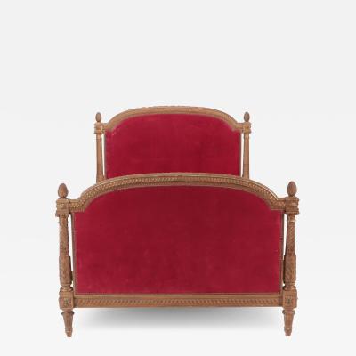 A French giltwood Louis XVI style full size bed C 1900 