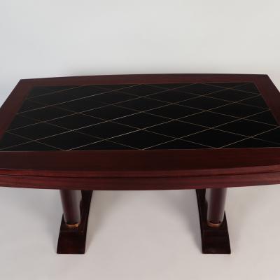 A French mahogany Art Deco dining table by Robert Desnos circa 1930 
