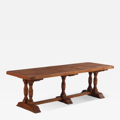 A French oak trestle table late 19th C 