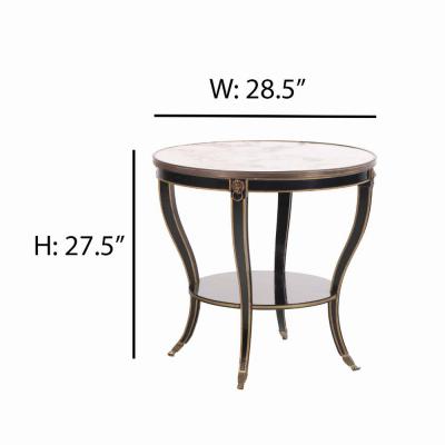 A French round marble top ebonized and gilt table C 1940 