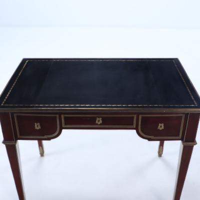 A French three drawer mahogany bureau plat desk circa 1930