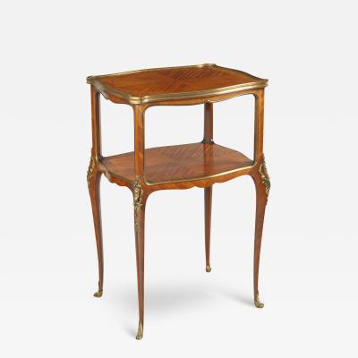 A French two tier kingwood marquetry side table