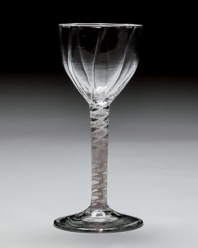 A GENEROUS PANEL MOULDED OPAQUE TWIST WINE GLASS