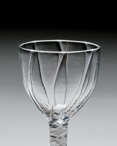 A GENEROUS PANEL MOULDED OPAQUE TWIST WINE GLASS