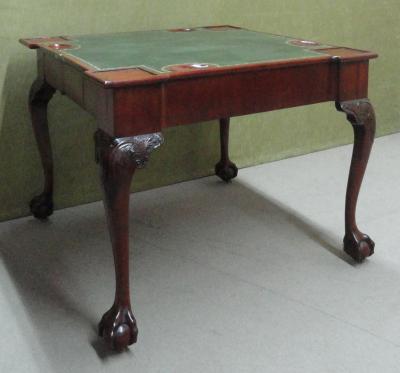 A GEORGE II MAHOGANY GAMES TABLE
