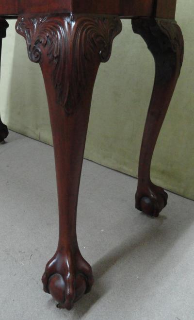 A GEORGE II MAHOGANY GAMES TABLE