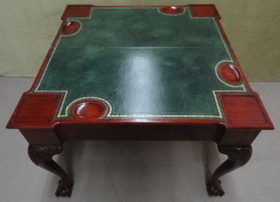 A GEORGE II MAHOGANY GAMES TABLE