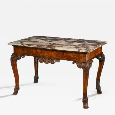 A GEORGE II PERIOD CARVED WALNUT SIDE TABLE